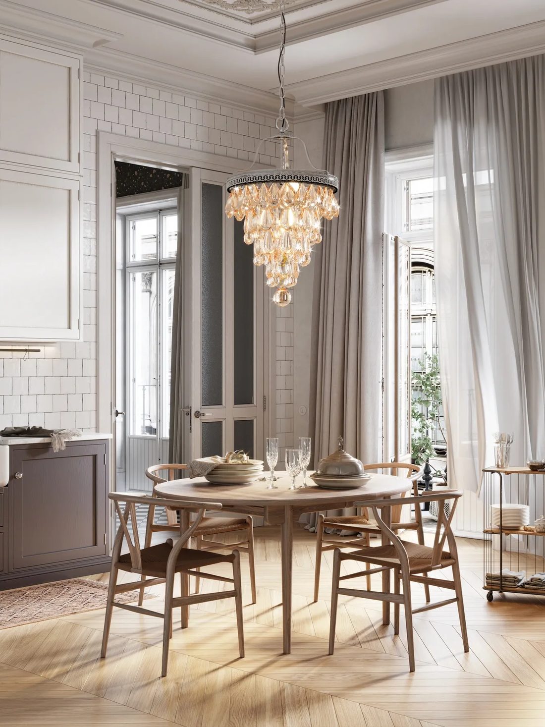 Classic kitchen and dining room with painted cabinetry, subway tile and a crystal chandelier